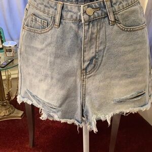 Distressed cut off jeans, size medium